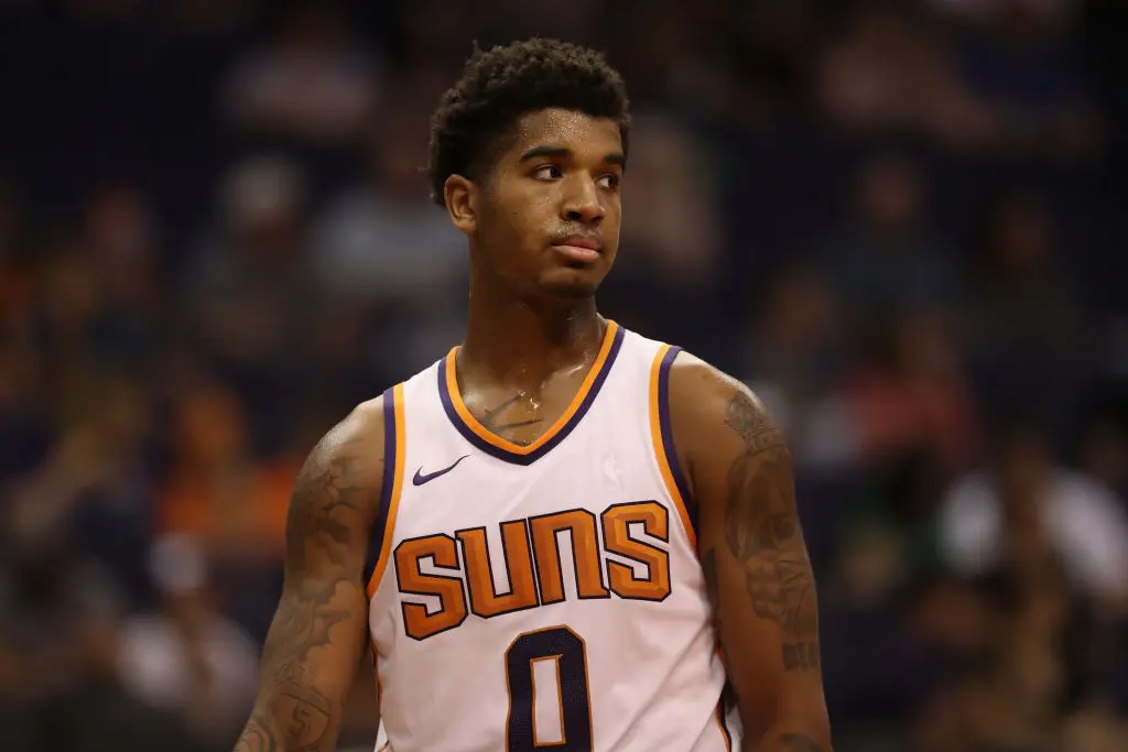 PHOENIX, AZ - OCTOBER 13: Marquese Chriss #0 of the Phoenix Suns during the second half of the NBA preseason game against the Brisbane Bullets at Talking Stick Resort Arena