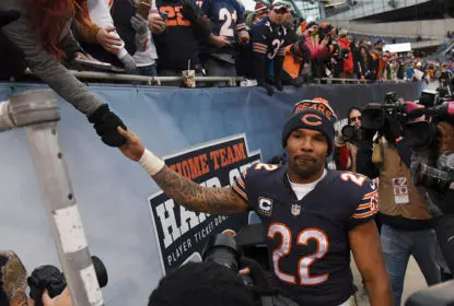 CHICAGO, IL- JANUARY 03: Matt Forte #22 of the Chicago Bears shakes hands with the fans after the game against the Detroit Lions on January 3, 2016 at Soldier Field in Chicago, Illinois. The Lions won 24-20.