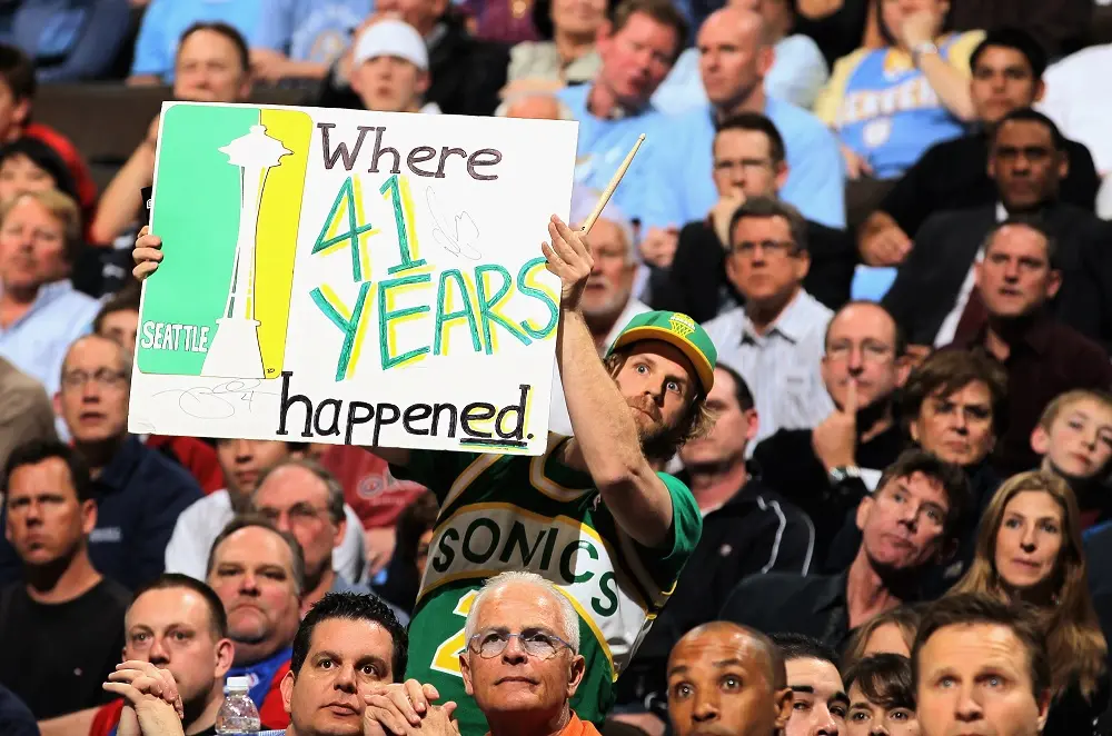DENVER, CO - APRIL 23: Seattle Sonics fans display signs as the support the Denver Nuggets against the Oklahoma City Thunder in Game Three of the Western Conference Quarterfinals in the 2011 NBA Playoffs on April 23, 2011 at the Pepsi Center in Denver, Colorado