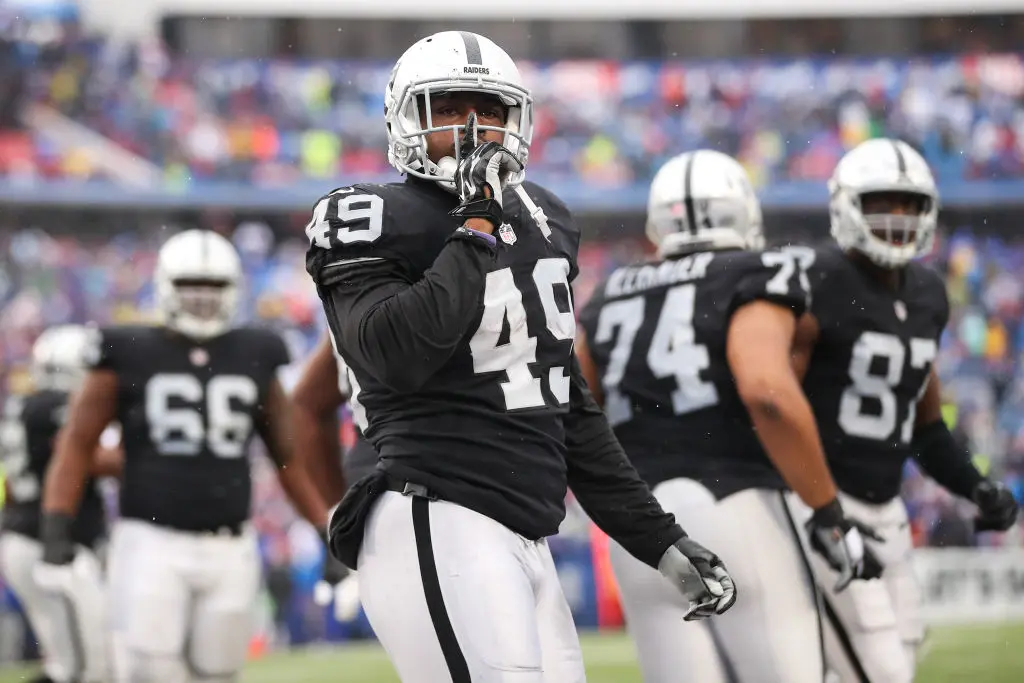 Jamize Olawale #49 of the Oakland Raiders celebrates after scoring a touchdown during the first quarter of an NFL game against the Buffalo Bills on October 29, 2017 at New Era Field in Orchard Park, New York.