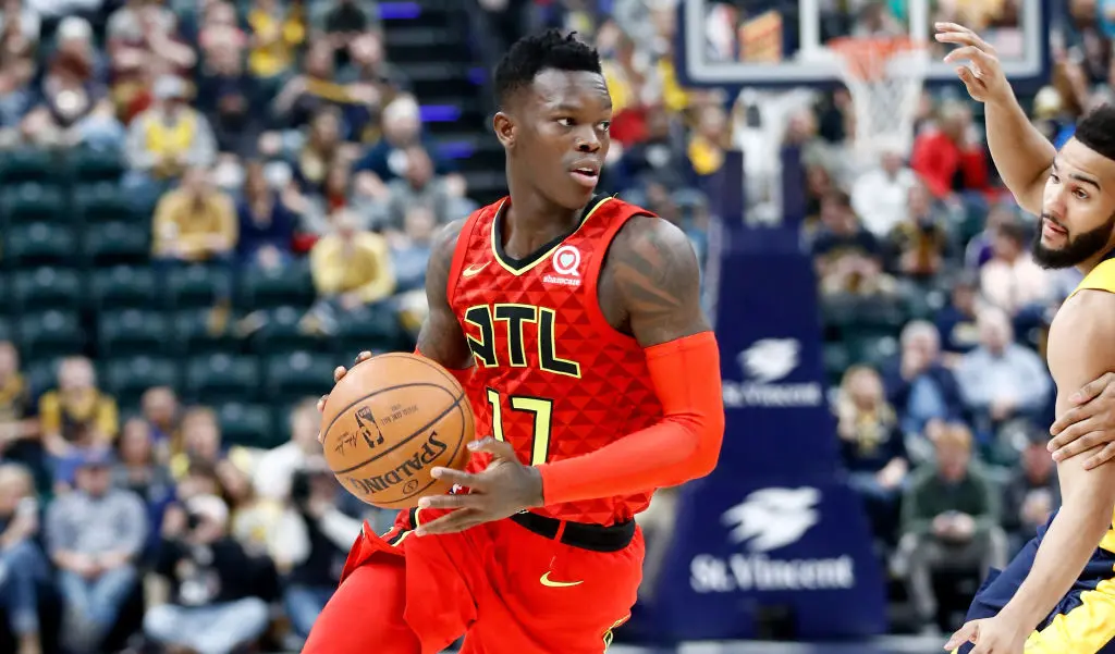 INDIANAPOLIS, IN - FEBRUARY 23: Dennis Schroder #17 of the Atlanta Hawks dribbles the ball against the Indiana Pacers during the game at Bankers Life Fieldhouse on February 23, 2018 in Indianapolis, Indiana