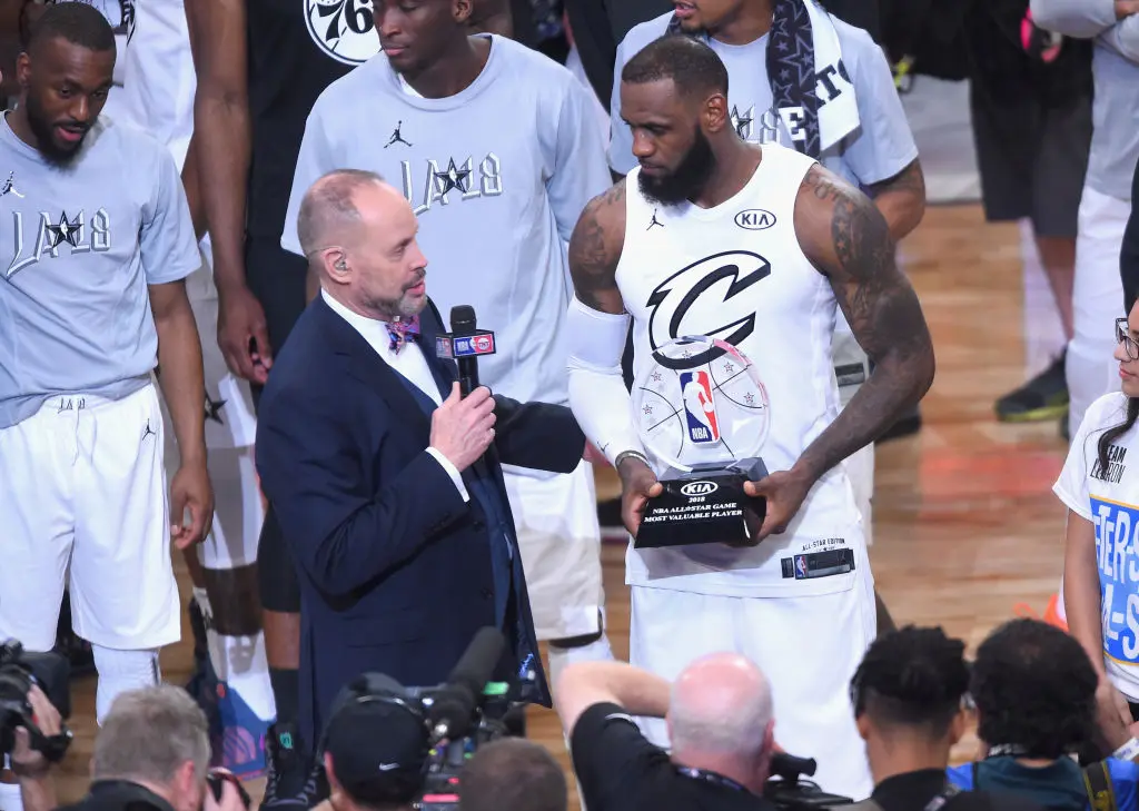 LOS ANGELES, CA - FEBRUARY 18: LeBron James #23 accepts the MVP award from TNT sportscaster Ernie Johnson Jr. during the NBA All-Star Game 2018 at Staples Center on February 18, 2018 in Los Angeles, California.
