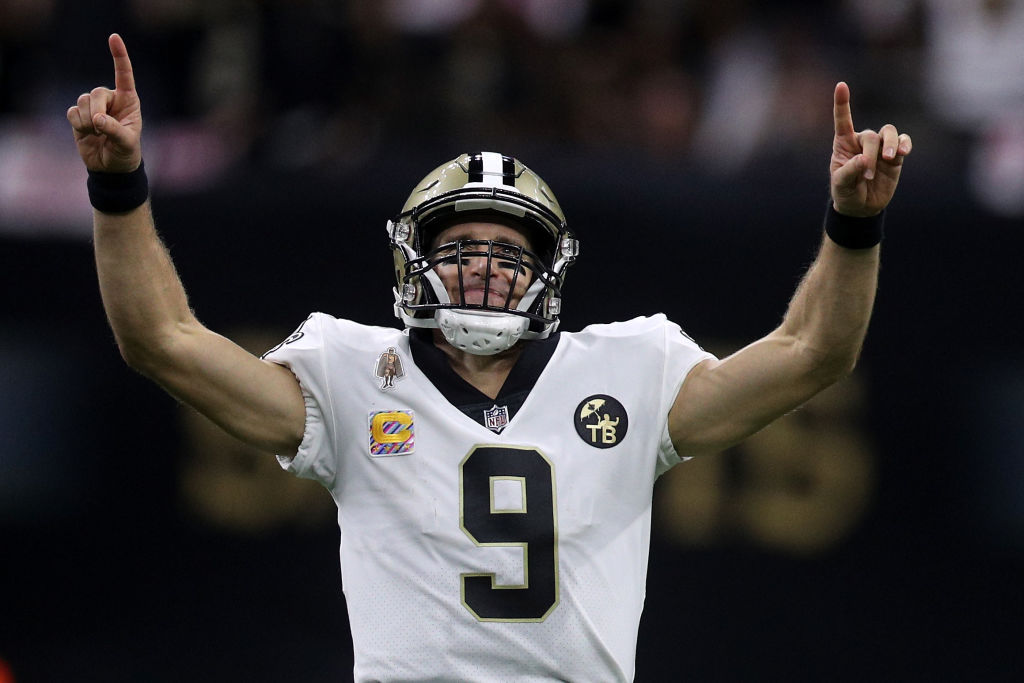 NEW ORLEANS, LA - OCTOBER 08: Drew Brees #9 of the New Orleans Saints reacts after throwing a 62 yard pass to take the all time yardage record against the Washington Redskins at Mercedes-Benz Superdome on October 8, 2018 in New Orleans, Louisiana