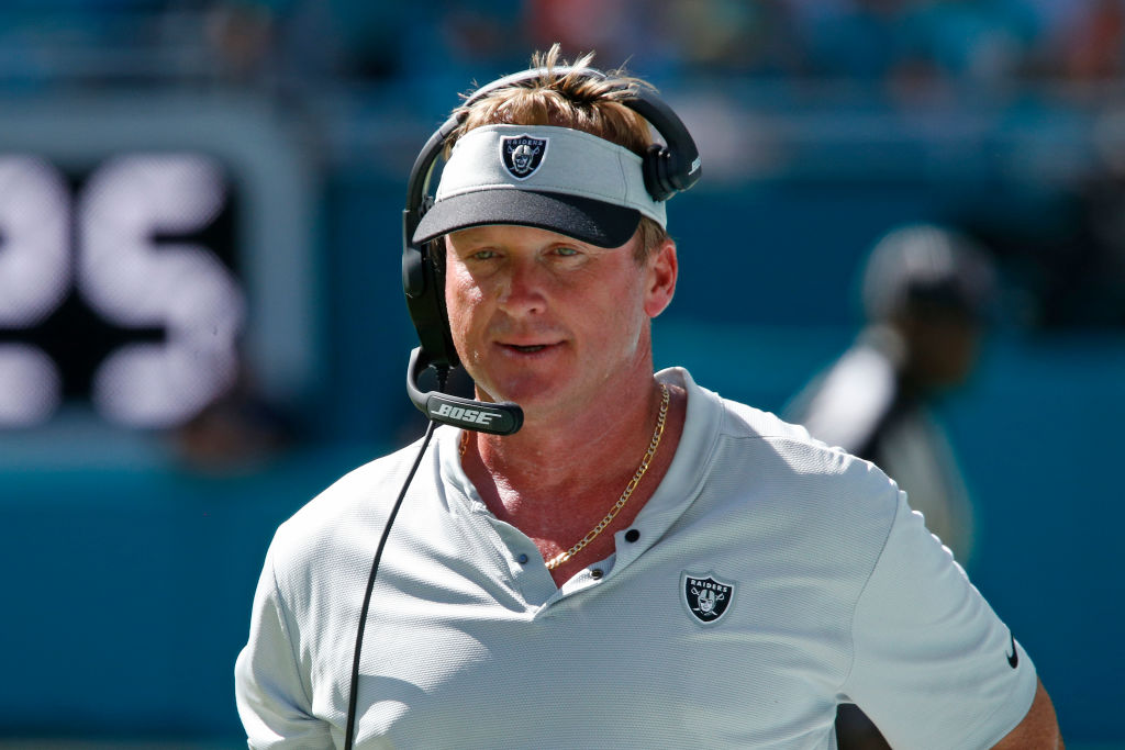 MIAMI GARDENS, FL - SEPTEMBER 23: Head coach Jon Gruden of the Oakland Raiders looks on during fourth quarter action against the Miami Dolphins during an NFL game on September 23, 2018 at Hard Rock Stadium in Miami Gardens, Florida. Miami defeated Oakland 28-20