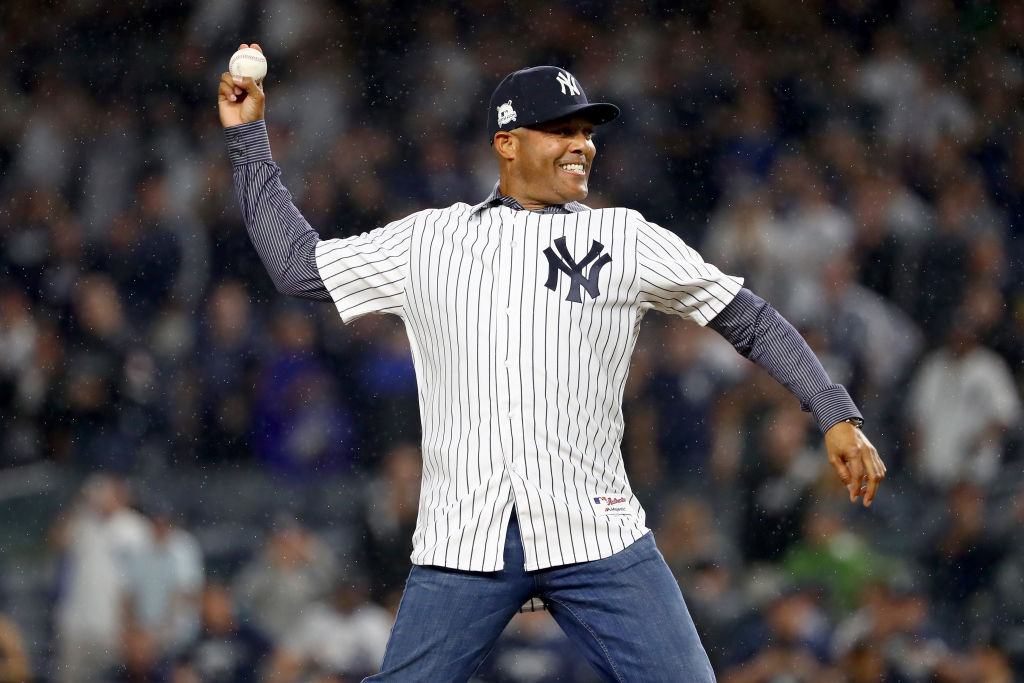 NEW YORK, NY - OCTOBER 09: Former pitcher Mariano Rivera throws out the ceremonial first pitch prior to Game Four of the American League Divisional Series between the Cleveland Indians and the New York Yankees at Yankee Stadium on October 9, 2017 in the Bronx borough of New York City