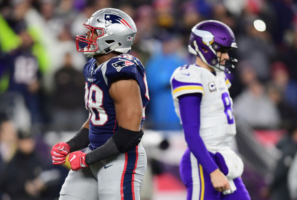 FOXBOROUGH, MA - DECEMBER 02: Trey Flowers #98 of the New England Patriots reacts in front of Kirk Cousins #8 of the Minnesota Vikings during the second half at Gillette Stadium on December 2, 2018 in Foxborough, Massachusetts