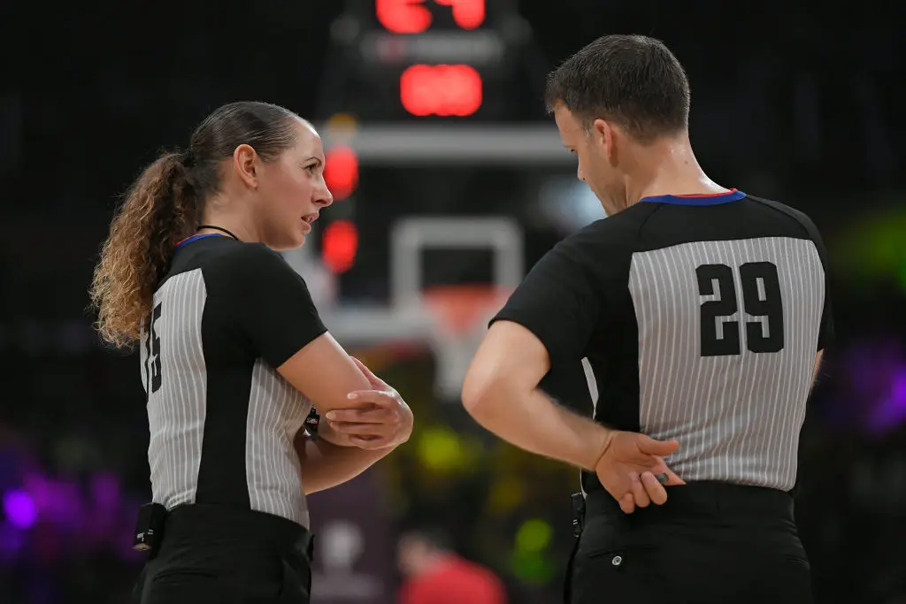 LOS ANGELES, CA - JANUARY 15: Referee Ashley Moyer-Gleich #75 and referee Mark Lindsay #29 have a conversation during the Los Angeles Lakers vs Chicago Bulls at Staples Center