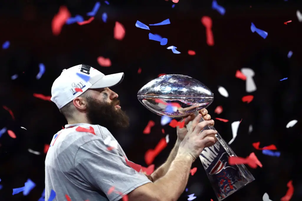 ATLANTA, GEORGIA - FEBRUARY 03: Julian Edelman #11 of the New England Patriots celebrates with the Vince Lombardi Trophy after his teams 13-3 win over the Los Angeles Rams during Super Bowl LIII at Mercedes-Benz Stadium on February 03, 2019 in Atlanta, Georgia