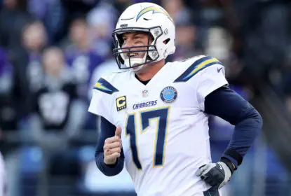 BALTIMORE, MARYLAND - JANUARY 06: Philip Rivers #17 of the Los Angeles Chargers celebrates after throwing a two point conversion to Mike Williams #81 against the Baltimore Ravens during the fourth quarter in the AFC Wild Card Playoff game at M&T Bank Stadium on January 06, 2019 in Baltimore, Maryland
