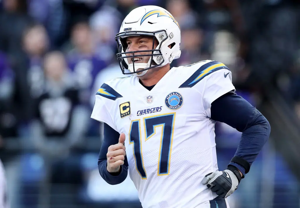 BALTIMORE, MARYLAND - JANUARY 06: Philip Rivers #17 of the Los Angeles Chargers celebrates after throwing a two point conversion to Mike Williams #81 against the Baltimore Ravens during the fourth quarter in the AFC Wild Card Playoff game at M&T Bank Stadium on January 06, 2019 in Baltimore, Maryland