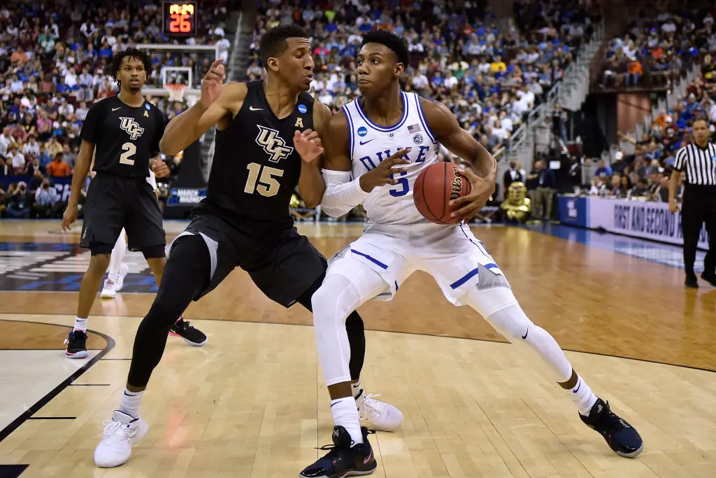 COLUMBIA, SC - MARCH 24: RJ Barrett #5 of the Duke Blue Devils moves the ball against Aubrey Dawkins #15 of the Central Florida Knights in the second half during the second round of the 2019 NCAA Men's Basketball Tournament at Colonial Life Arena on March 24, 2019 in Columbia, South Carolina