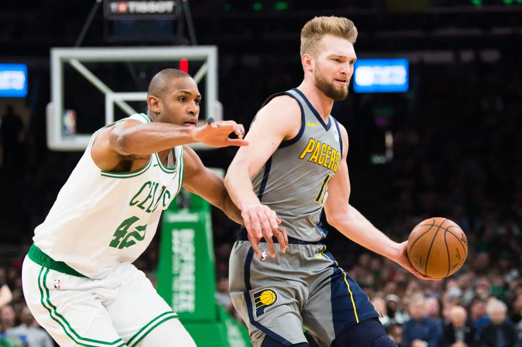 BOSTON, MA - MARCH 29: Domantos Sabonis #11 of the Indiana Pacers is defended by Al Horford #42 of the Boston Celtics at TD Garden on March 29, 2019 in Boston, Massachusetts