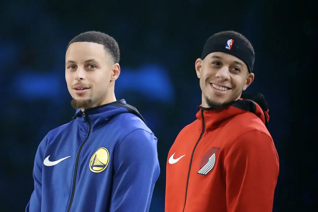 CHARLOTTE, NORTH CAROLINA - FEBRUARY 16: (L-R) Stephen Curry #30 of the Golden State Warriors and Seth Curry #31 of the Portland Trail Blazers look on before the MTN DEW 3-Point Contest as part of the 2019 NBA All-Star Weekend at Spectrum Center on February 16, 2019 in Charlotte, North Carolina. (Photo by 
