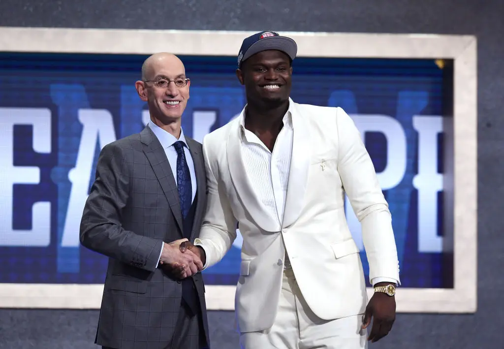 NEW YORK, NEW YORK - JUNE 20: Zion Williamson poses with NBA Commissioner Adam Silver after being drafted with the first overall pick by the New Orleans Pelicans during the 2019 NBA Draft at the Barclays Center on June 20, 2019 in the Brooklyn borough of New York City