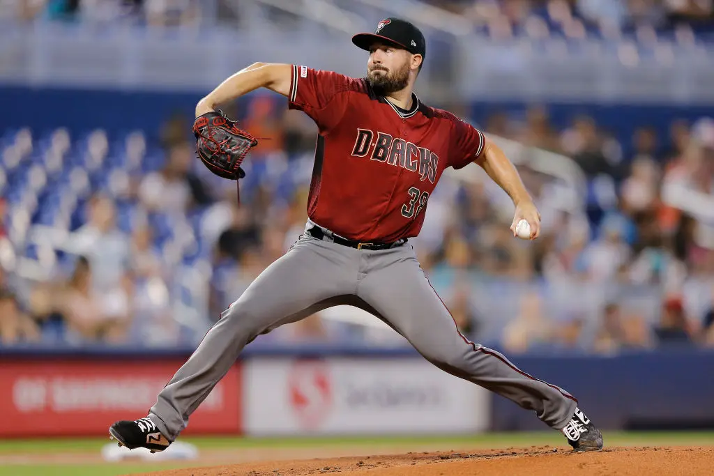 MIAMI, FLORIDA - JULY 28: Robbie Ray #38 of the Arizona Diamondbacks delivers a pitch in the first inning against the Miami Marlins at Marlins Park on July 28, 2019 in Miami, Florida
