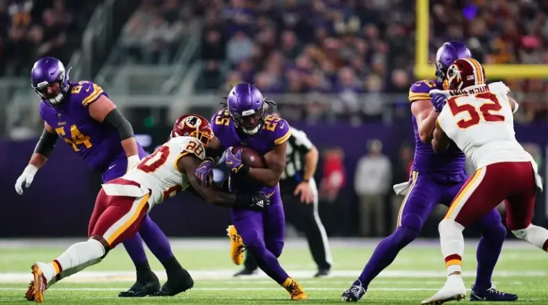 Dalvin Cook em ação pelo confronto entre Minnesota Vikings e Washington Redskins