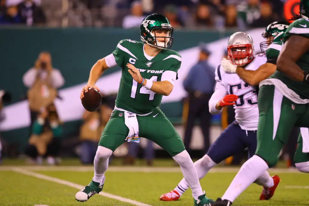 EAST RUTHERFORD, NJ - OCTOBER 21: New York Jets quarterback Sam Darnold (14) drops back to pass during the National Football League game between the New York Jets and the New England Patriots on October 21, 2019 at MetLife Stadium in East Rutherford, NJ