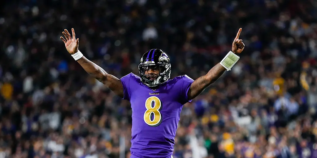 Lamar Jackson em ação pelo Baltimore Ravens pela semana 12 da NFL