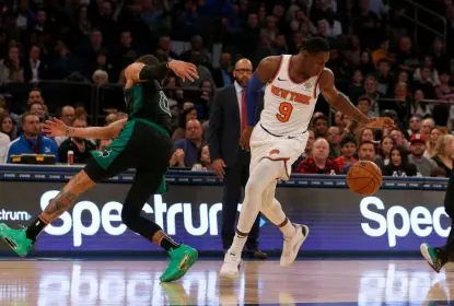 NEW YORK, NEW YORK - OCTOBER 26: (NEW YORK DAILIES OUT) RJ Barrett #9 of the New York Knicks in action against Jayson Tatum #0 of the Boston Celtics at Madison Square Garden on October 26, 2019 in New York City. The Celtics defeated the Knicks 118-95