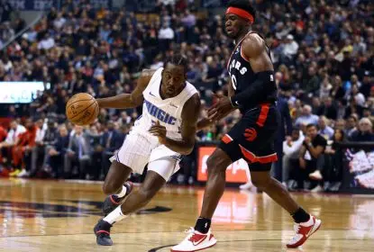 TORONTO, ON - NOVEMBER 20: Al-Farouq Aminu #2 of the Orlando Magic dribbles the ball as Terence Davis II #0 of the Toronto Raptors defends during the first half of an NBA game at Scotiabank Arena on November 20, 2019 in Toronto, Canada. NOTE TO USER: User expressly acknowledges and agrees that, by downloading and or using this photograph, User is consenting to the terms and conditions of the Getty Images License Agreement.