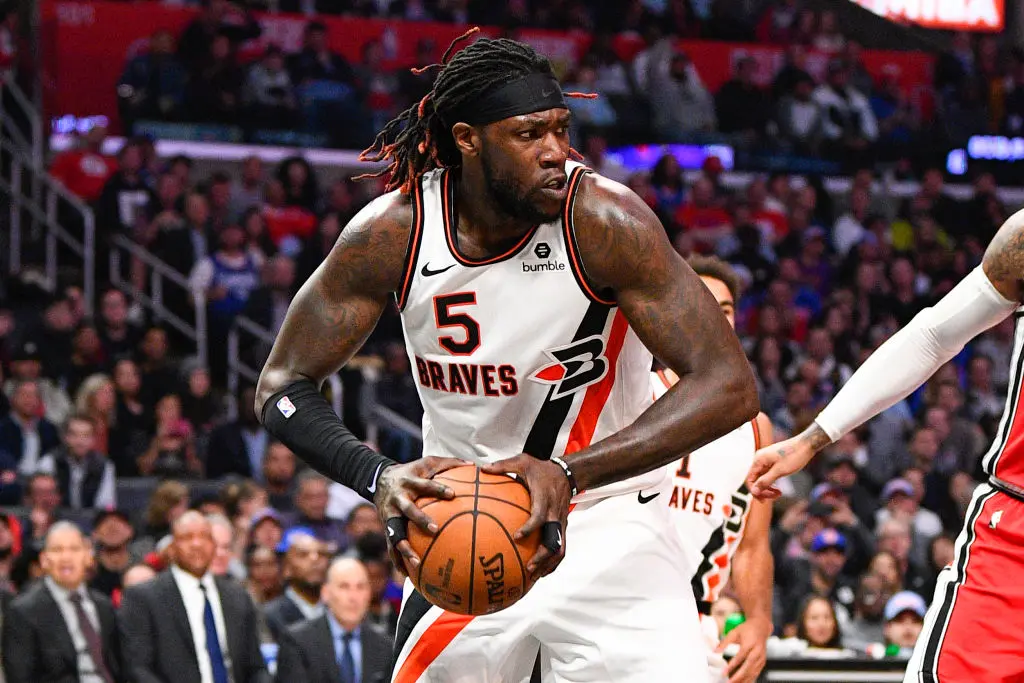LOS ANGELES, CA - DECEMBER 03: Los Angeles Clippers Center Montrezl Harrell (5) grabs a rebound during a NBA game between the Portland Trail Blazers and the Los Angeles Clippers on December 3, 2019 at STAPLES Center in Los Angeles, CA