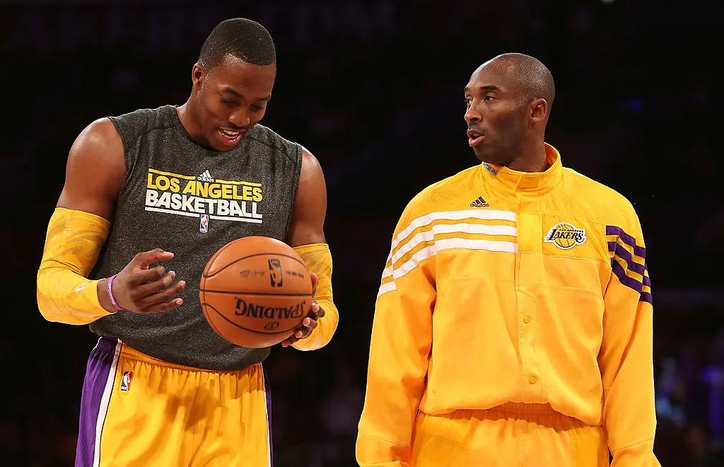 LOS ANGELES, CA - OCTOBER 21: Dwight Howard #12 (L) and Kobe Bryant #24 of the Los Angeles Lakers talks as they warm up to play the Sacramento Kings at Staples Center on October 21, 2012 in Los Angeles, California