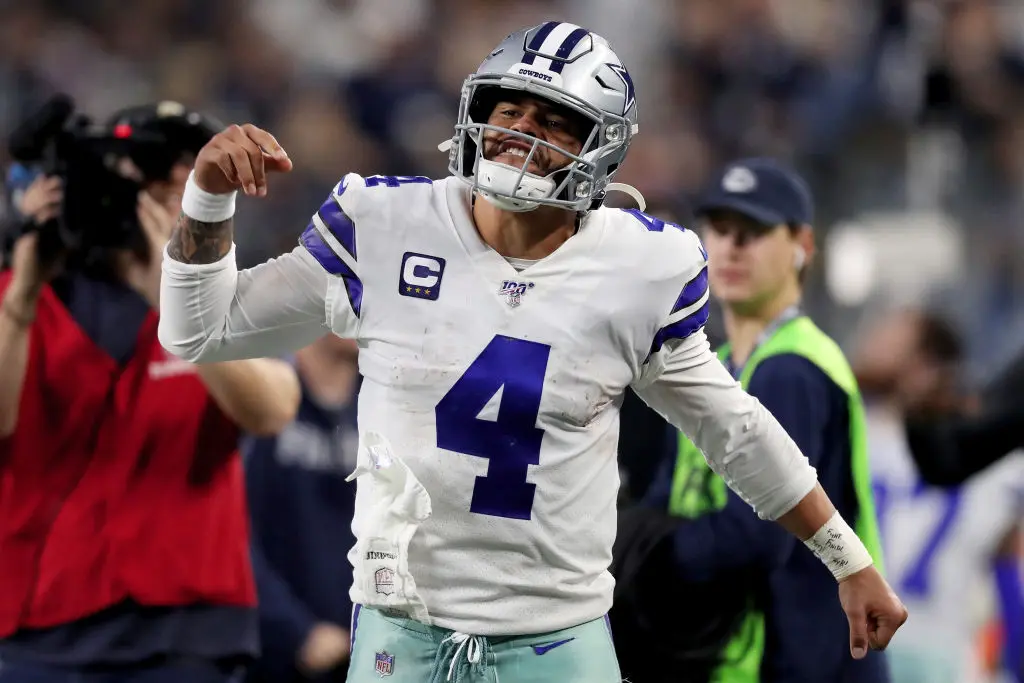 ARLINGTON, TEXAS - DECEMBER 29: Dak Prescott #4 of the Dallas Cowboys reacts in the third quarter against the Washington Redskins in the game at AT&T Stadium on December 29, 2019 in Arlington, Texas