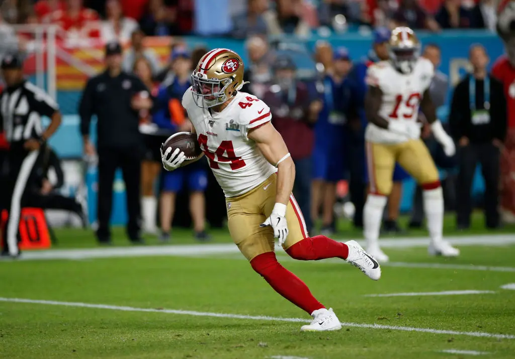 MIAMI, FLORIDA - FEBRUARY 2: Kyle Juszczyk #44 of the San Francisco 49ers heads to the end zone on a 12 yard touchdown reception against the Kansas City Chiefs in Super Bowl LIV at Hard Rock Stadium on February 2, 2020 in Miami, Florida. The Chiefs defeated the 49ers 31-20