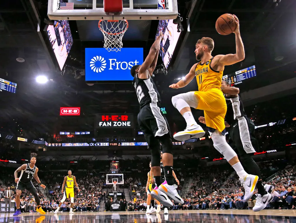 SAN ANTONIO, TX - MARCH 02: Domantas Sabonis #11 of the Indiana Pacers looks to pass as he is cut off by Rudy Gay #22 of the San Antonio Spurs during second half action at AT&T Center on March 02, 2020 in San Antonio, Texas. The Indiana Pacers defeated the San Antonio Spurs 116-111