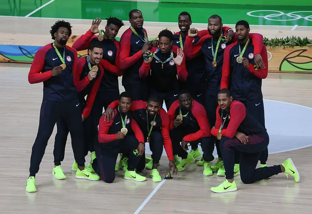 RIO DE JANEIRO, BRAZIL - AUGUST 21: 21: The United States Men's Basketball team celebrate with their gold medals after the final match of the Men's basketball between Serbia and United States on day 16 at Carioca Arena 1 in Rio de Janeiro, Brazil on August 21, 2016