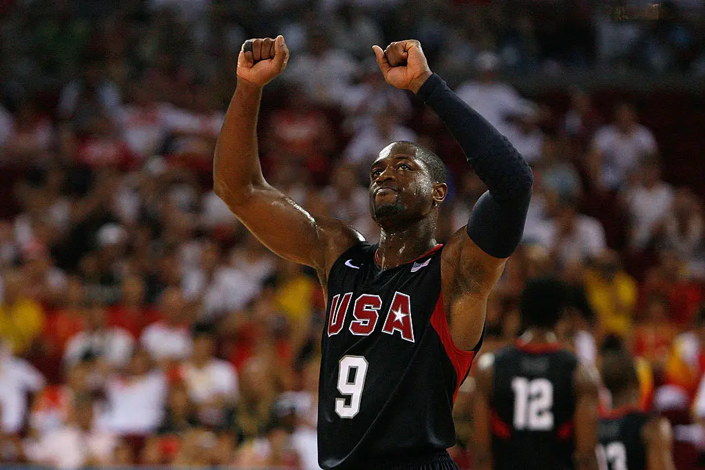 BEIJING - AUGUST 24: Dwyane Wade #9 of the United States celebrates in the fourth quarter of the gold medal game against Spain during Day 16 of the Beijing 2008 Olympic Games at the Beijing Olympic Basketball Gymnasium on August 24, 2008 in Beijing, China