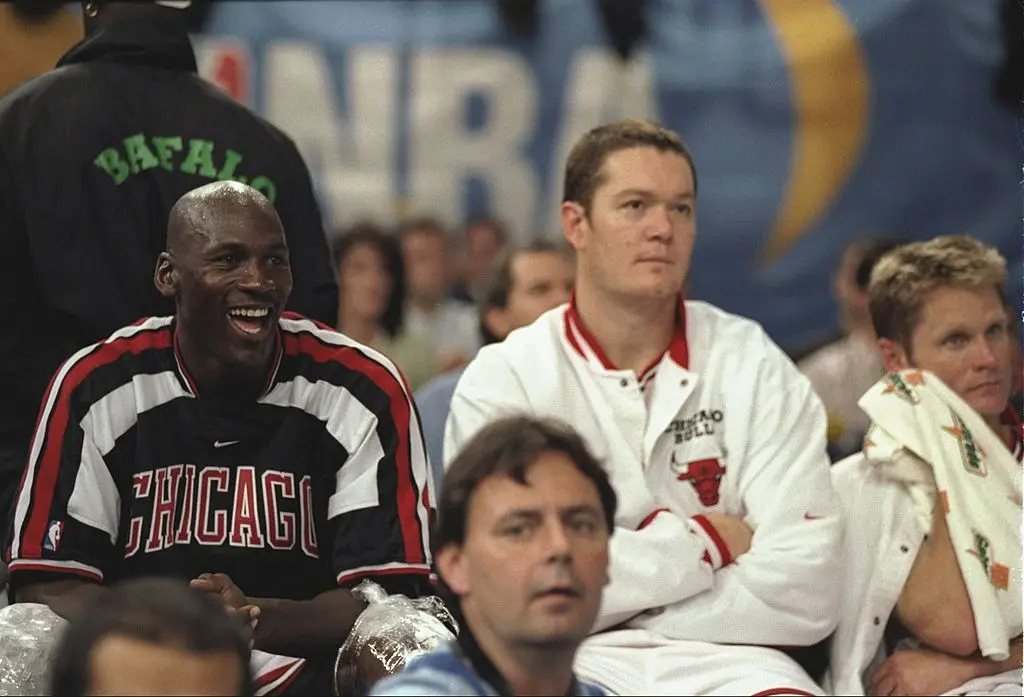 18 Oct 1997: Michael Jordan, left, Luc Longley, center, and Steve Kerr, right, of the Chicago Bulls watch the action from the bench between the Chicago Bulls and the Olympiakos during the McDonald''s Championship at the Palais Omnisports De Paris-Bercy in Paris, France. The Bulls won the game 104-78.