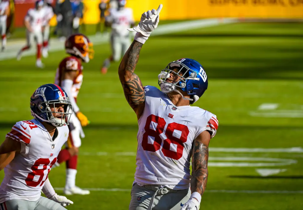 LANDOVER, MD - NOVEMBER 08: New York Giants tight end Evan Engram (88) celebrates with wide receiver Austin Mack (81) after catching a 16 yard touchdown pass in the second quarter during the New York Giants game versus the Washington Football Team on November 8, 2020 at FedEx Field in Landover, MD