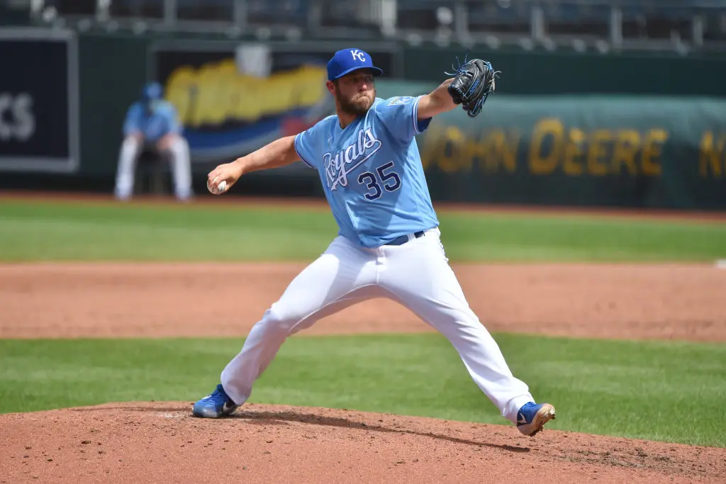 KANSAS CITY, MO - AUGUST 9: Relief pitcher Greg Holland #35 of the Kansas City Royals throws in the sixth inning Minnesota Twins at Kauffman Stadium on August 9, 2020 in Kansas City, Missouri