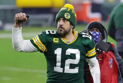GREEN BAY, WISCONSIN - JANUARY 16: Aaron Rodgers #12 of the Green Bay Packers celebrates defeating the Los Angeles Rams 32-18 in the NFC Divisional Playoff game at Lambeau Field on January 16, 2021 in Green Bay, Wisconsin
