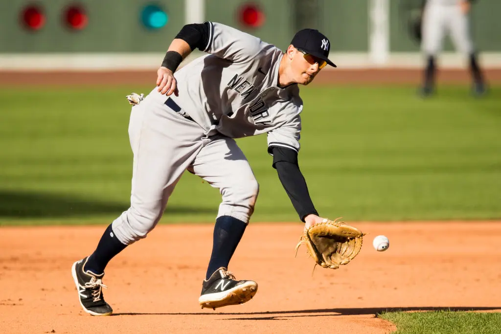 BOSTON, MA - SEPTEMBER 20: DJ LeMahieu #26 of the New York Yankees fields a ground ball during the game between the New York Yankees and the Boston Red Sox at Fenway Park on Sunday, September 20, 2020 in Boston, Massachusetts
