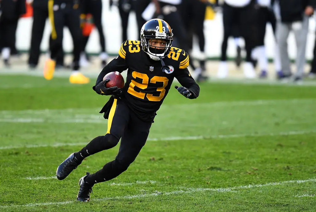 PITTSBURGH, PA - DECEMBER 02: Joe Haden #23 of the Pittsburgh Steelers carries the ball for a touchdown after intercepting a pass during the first quarter against the Baltimore Ravens at Heinz Field on December 1, 2020 in Pittsburgh, Pennsylvania