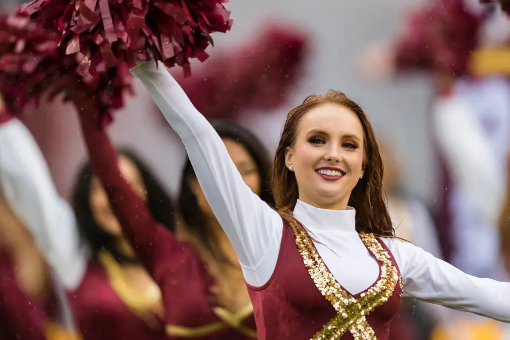 LANDOVER, MD - OCTOBER 20: Washington Redskins cheerleaders take the field before the game against the San Francisco 49ers at FedExField on October 20, 2019 in Landover, Maryland.