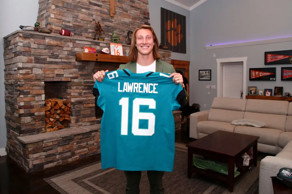 SENECA, SOUTH CAROLINA - APRIL 29: In this handout photo provided by the National Football League, quarterback Trevor Lawrence poses after being selected with the first overall pick by the Jacksonville Jaguars in the 2021 NFL Draft on April 29, 2021 in Seneca, South Carolina
