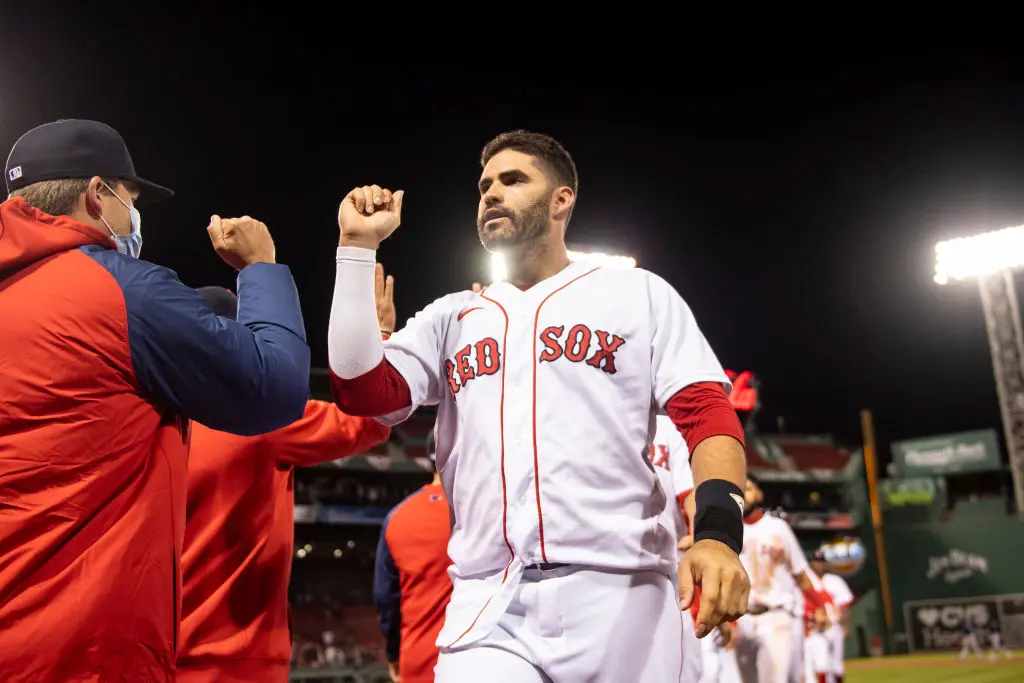 BOSTON, MA - APRIL 6: J.D. Martinez #28 of the Boston Red Sox reacts after hitting a game winning walk-off single during the twelfth inning against the Tampa Bay Rays on April 6, 2021 at Fenway Park in Boston, Massachusetts