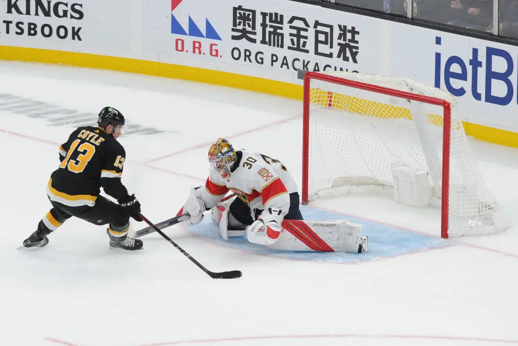 BOSTON, MA - OCTOBER 30: Charlie Coyle #13 of the Boston Bruins scores in a shoot out against the Florida Panthers at the TD Garden on October 30, 2021 in Boston, Massachusetts