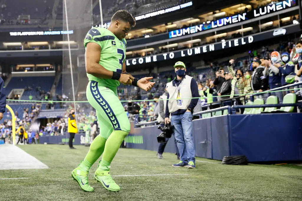 SEATTLE, WASHINGTON - OCTOBER 07: Russell Wilson #3 of the Seattle Seahawks walks off the field after losing to the Los Angeles Rams 26-17 at Lumen Field on October 07, 2021 in Seattle, Washington.