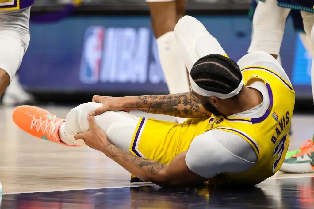 MINNEAPOLIS, MN - DECEMBER 17: Anthony Davis #3 of the Los Angeles Lakers reacts after getting injured in the third quarter. Davis did not return against the Minnesota Timberwolves at Target Center on December 17, 2021 in Minneapolis, Minnesota. The Timberwolves defeated the Lakers 110-92