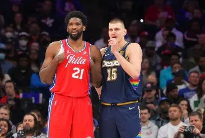 PHILADELPHIA, PA - MARCH 14: Joel Embiid #21 of the Philadelphia 76ers talks to Nikola Jokic #15 of the Denver Nuggets at the Wells Fargo Center on March 14, 2022 in Philadelphia, Pennsylvania. The Nuggets defeated the 76ers 114-110