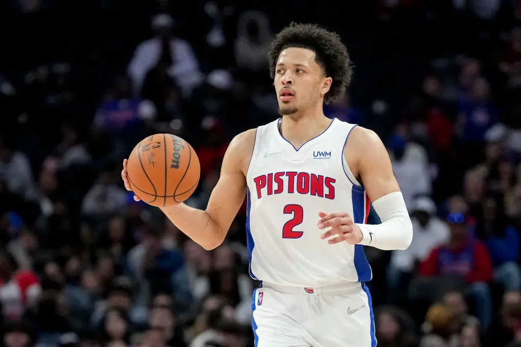 DETROIT, MICHIGAN - MARCH 23: Cade Cunningham #2 of the Detroit Pistons handles the ball against the Atlanta Hawks at Little Caesars Arena on March 23, 2022 in Detroit, Michigan