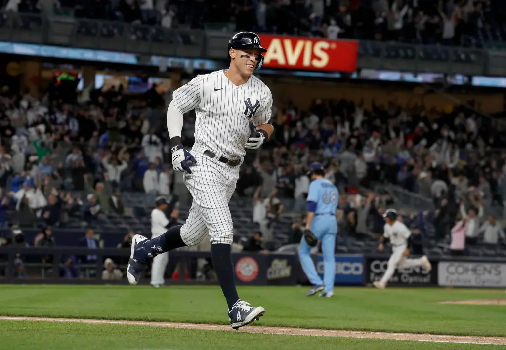 NEW YORK, NEW YORK - MAY 10: Aaron Judge #99 of the New York Yankees runs the bases after his ninth inning game winning three run home run against Jordan Romano #68 of the Toronto Blue Jays at Yankee Stadium on May 10, 2022 in New York City. The Yankees defeated the Blue Jays 6-5