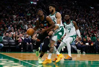 BOSTON, MA - MARCH 30: Jimmy Butler #22 of the Miami Heat is run into by Jayson Tatum #0 of the Boston Celtics during the second quarter at TD Garden on March 30, 2022 in Boston, Massachusetts