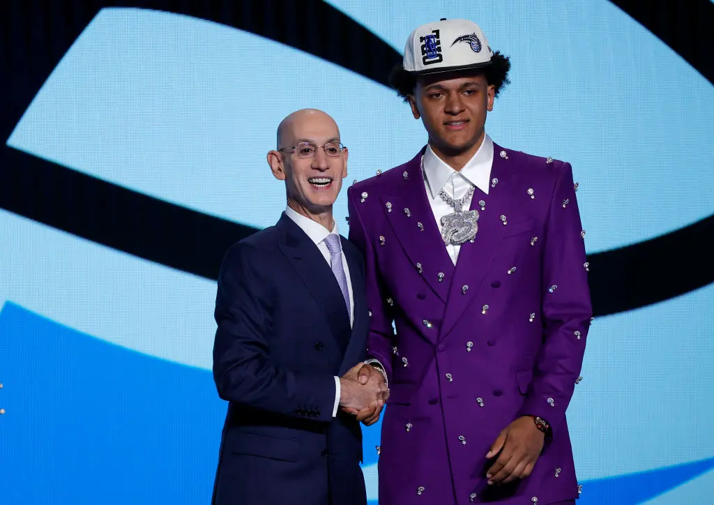 NEW YORK, NEW YORK - JUNE 23: NBA commissioner Adam Silver and Paolo Banchero pose for photos after Banchero was drafted with the 1st overall pick by the Orlando Magic during the 2022 NBA Draft at Barclays Center on June 23, 2022 in New York City