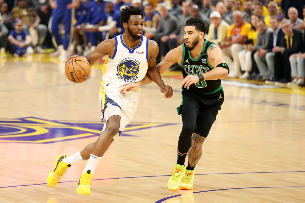 SAN FRANCISCO, CALIFORNIA - JUNE 13: Andrew Wiggins #22 of the Golden State Warriors brings the ball up court against Jayson Tatum #0 of the Boston Celtics during the first quarter in Game Five of the 2022 NBA Finals at Chase Center on June 13, 2022 in San Francisco, California