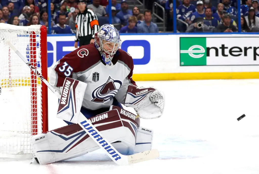TAMPA, FLORIDA - JUNE 22: Goaltender Darcy Kuemper #35 of the Colorado Avalanche makes a save against the Tampa Bay Lightning in the second period Game Three of the 2022 NHL Stanley Cup Final at Amalie Arena on June 22, 2022 in Tampa, Florida